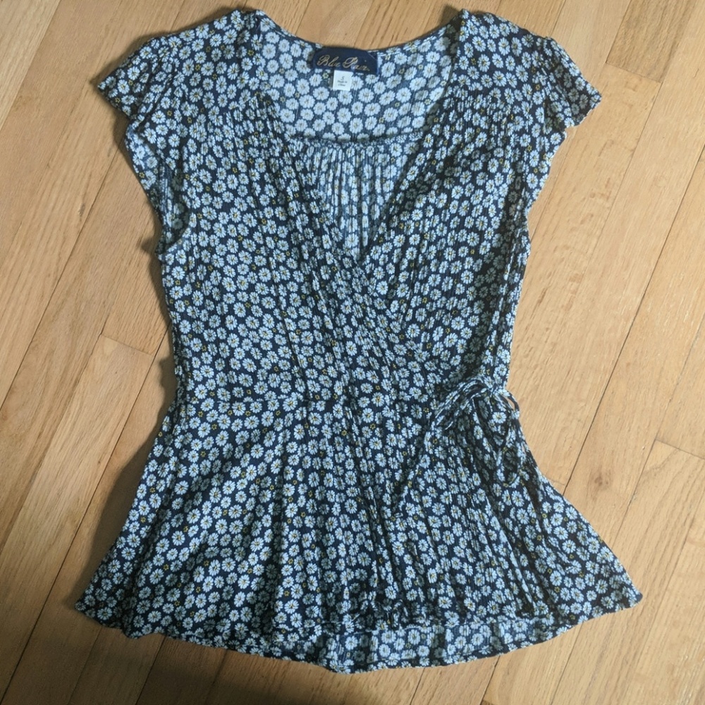 Wrap top with a flower pattern all over it.